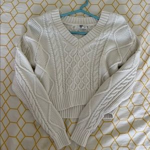 Tilly’s white knit sweater